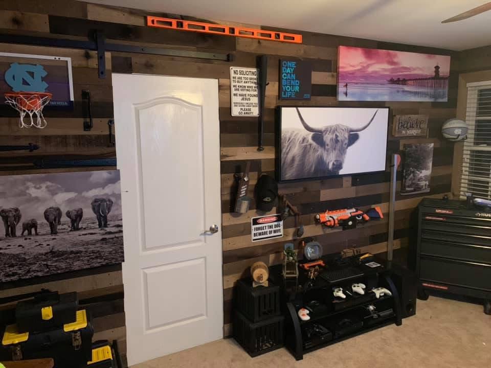 Finished media room with pallet wall